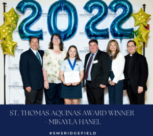 Saint Mary School Student Mikayla Hanel Receives St. Thomas Aquinas Award at Breakfast of Champions Event